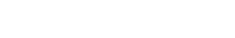 Hiker crossing a rocky stream